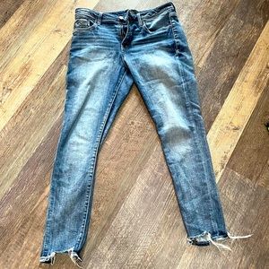 Buckle black skinny jeans